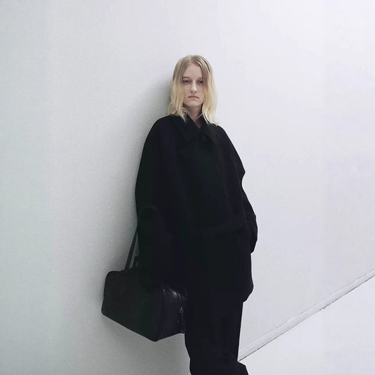 Elegant loose-fitting belted mid-length stand collar coat