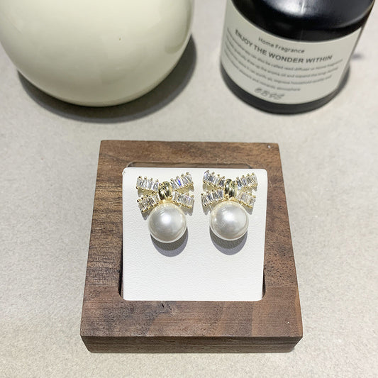 Women's Zircon Bow Pearl Earrings - Silver Needle